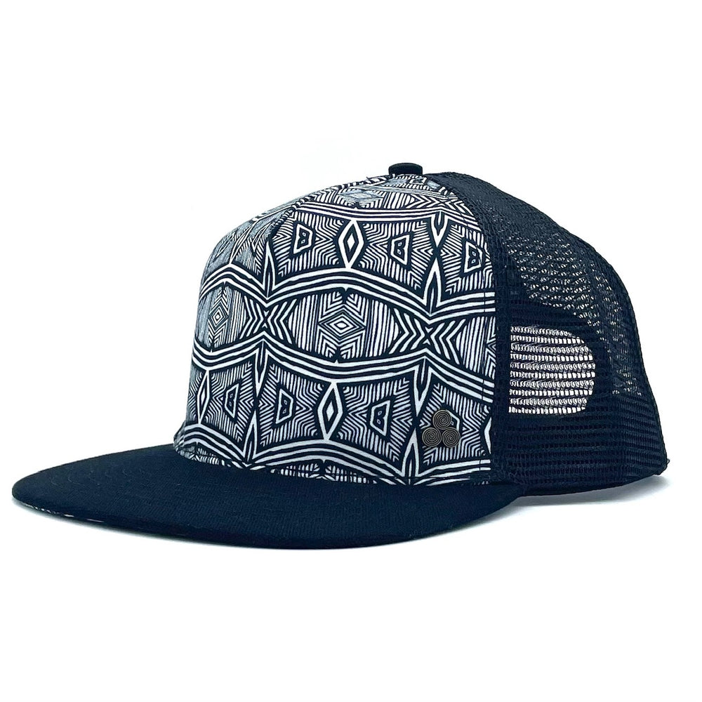 Profile view of the Afrika Trucker Hat showcasing its structured fit, adjustable snapback, and low-profile brim.