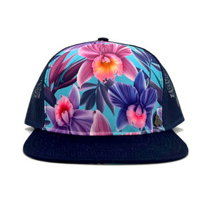 Front view of Floral Orchid Trucker Hat showing stylish five-panel construction.