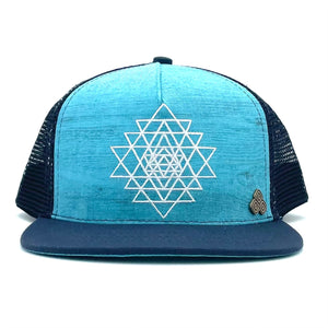 Front view of the Visions Sky Trucker Hat with Sri Yantra cosmic print, breathable mesh back, and adjustable snap closure.